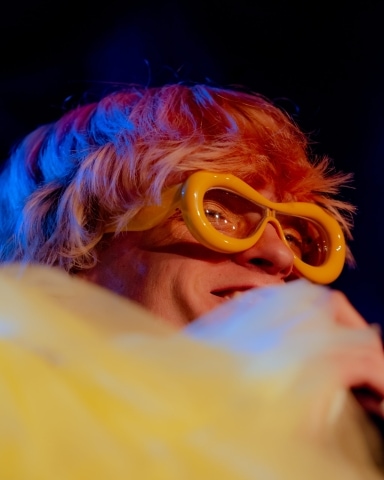Jake Wesley Rogers performs at  Bimbo's in San Francisco. Close up of his yellow glasses.