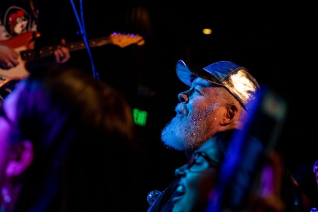 Glitter bearded man in audience watching Stacey Ryan perform at Bimbo's in San Francisco