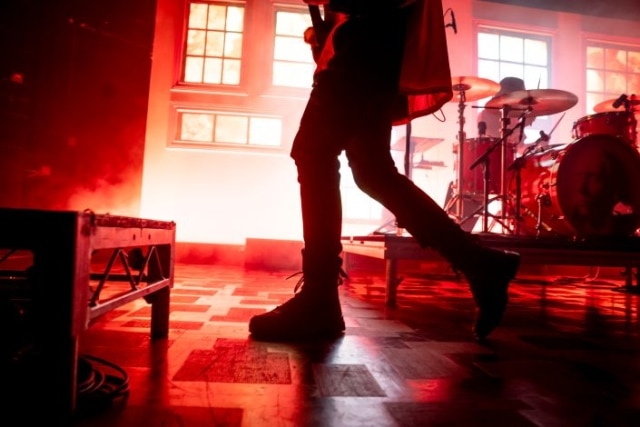 Silhouette of Waterparks guitarist, Geoff Wigington, performing at Ace of Spades in Sacramento. April 28, 2023